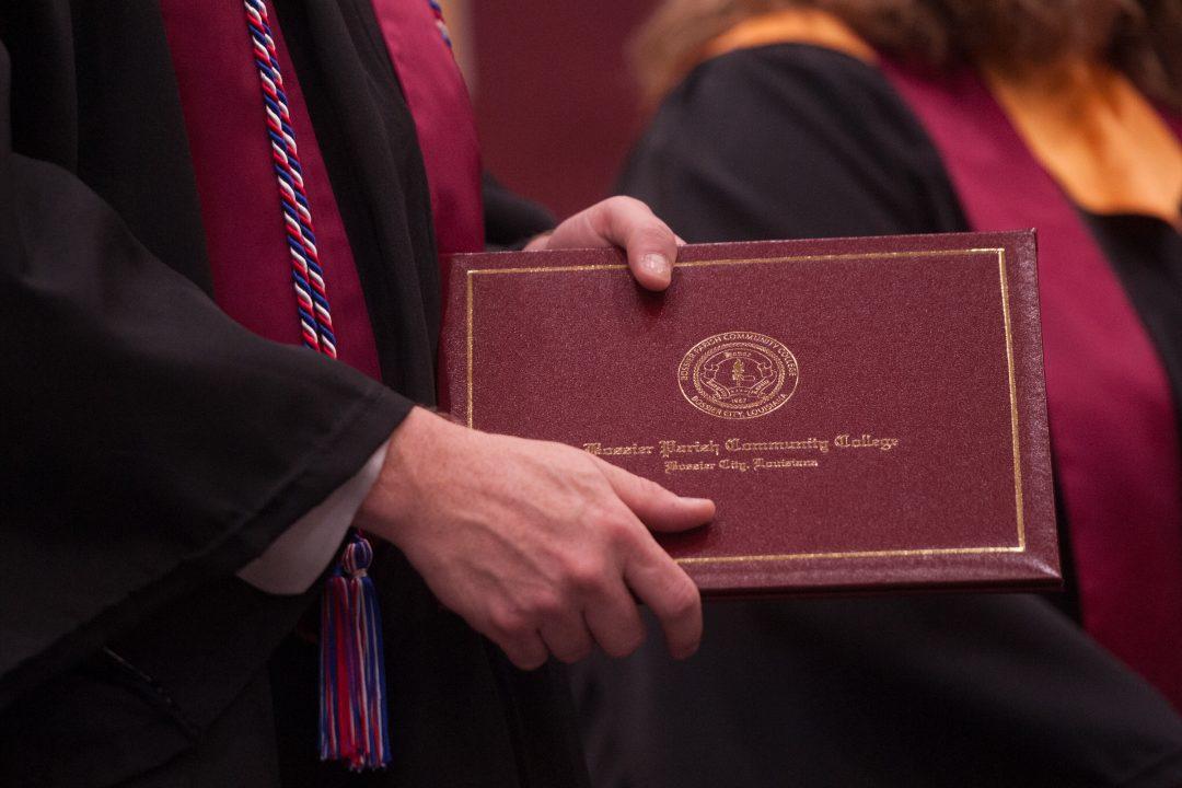 image of student receiving a diploma