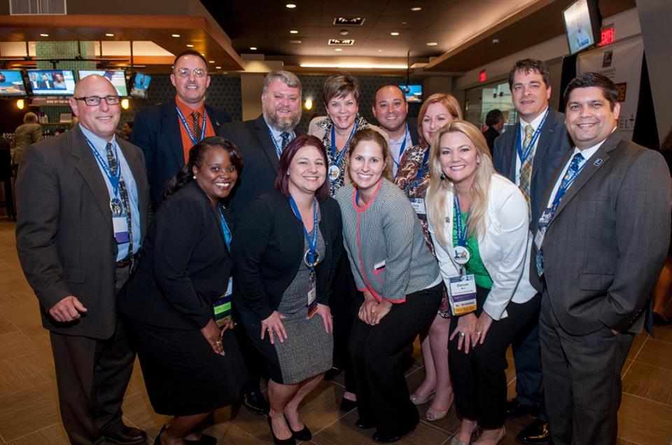 Colleagues posing for a photo at LCTCS Annual Conference